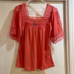 Women’s size small blouse.